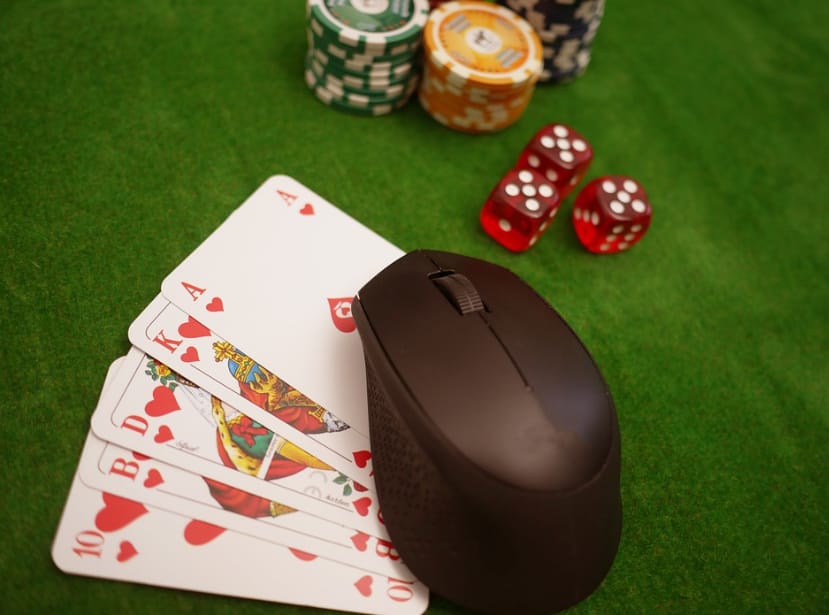 cards, mouse and tokens for casino